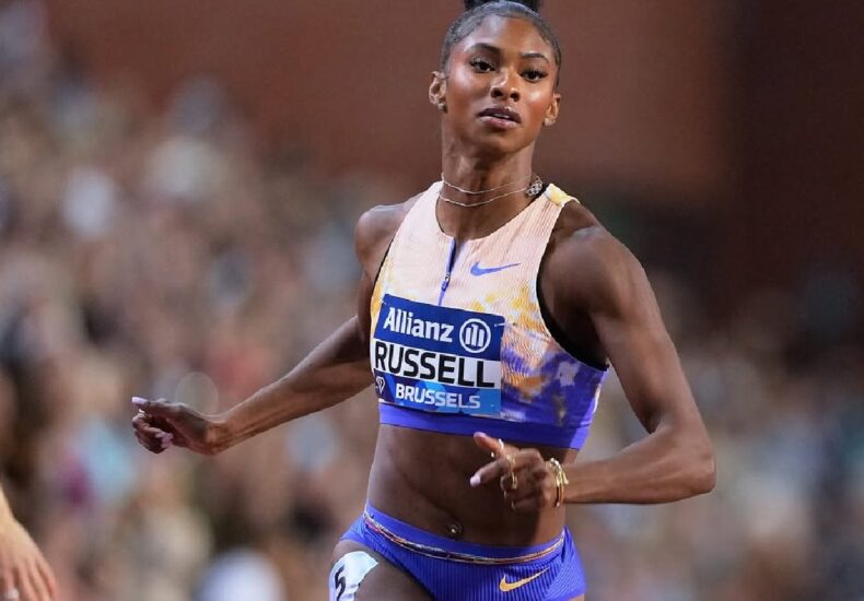 Masai Russell hurdles